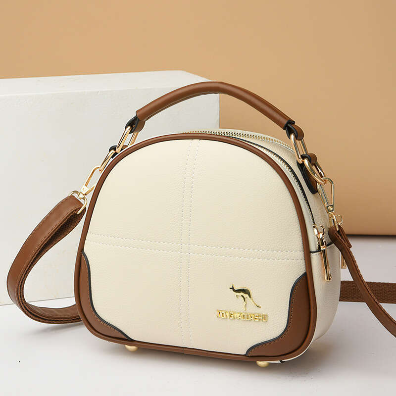 2025 New High-End Embroidered Crossbody Shoulder Women's Versatile Commuter Soft Leather Handbag Small Round Bag handbag for womens fashion bag