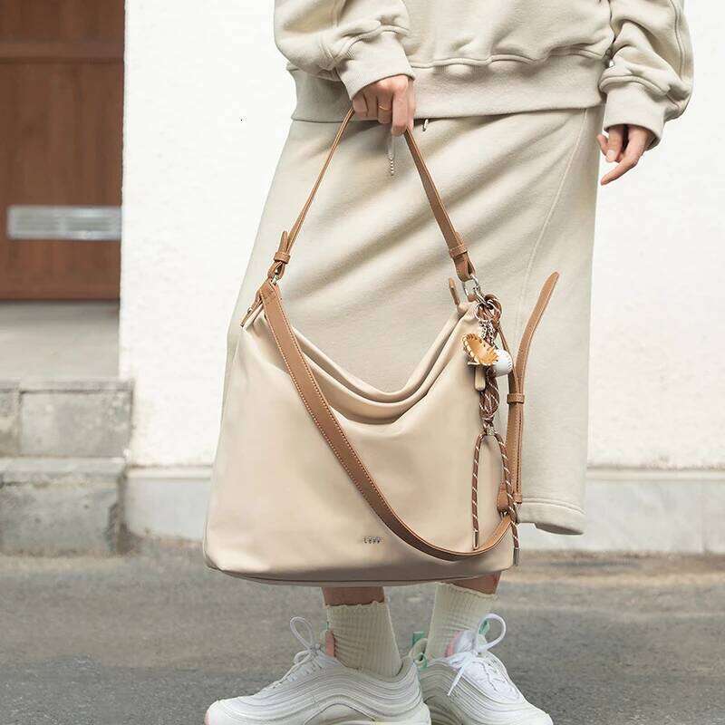 LEFF New Women's Large Capacity Tote Nylon Waterproof Travel Commuting Shoulder Bag High Quality Trendy Outdoor Bags 251029