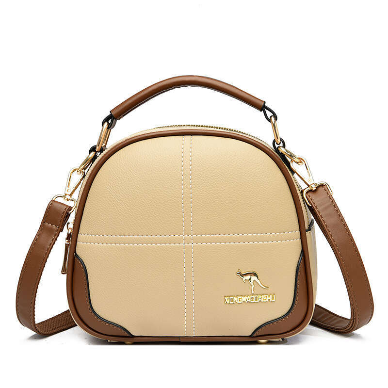 2025 New High-End Embroidered Crossbody Shoulder Women's Versatile Commuter Soft Leather Handbag Small Round Bag handbag for womens fashion bag