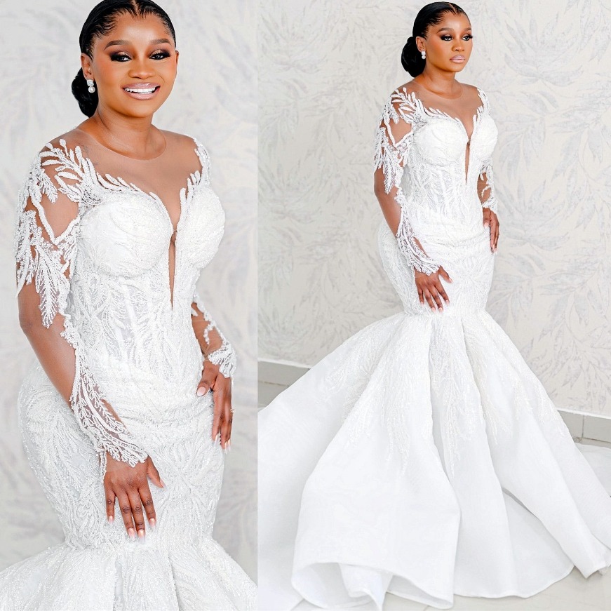 2026 Arabic Aso Ebi Plus Size Ivory Satin Mermaid Wedding Dresses Sequined Lace Sheer Neck Full Sleeves Bridal Gowns Dress O29