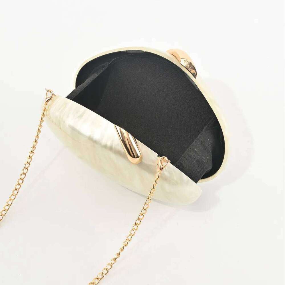 Designer Bags 2025 New Oval Acrylic Leaf Lock Dinner Fashion Wind Chain Shoulder Clutch Bag Luxury Bag