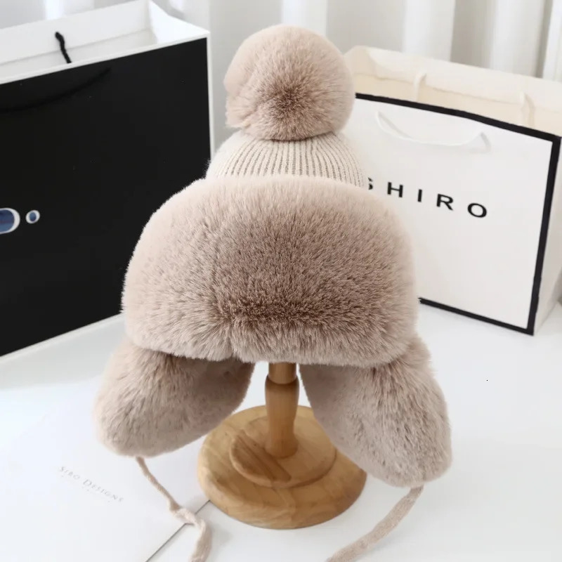 Autumn And Winter Lei Feng Hat For Women Fashion Trapper Earflap Ski Cap Female Thick Warm Beanie Hat Fur Pompom Russain Hats 251029
