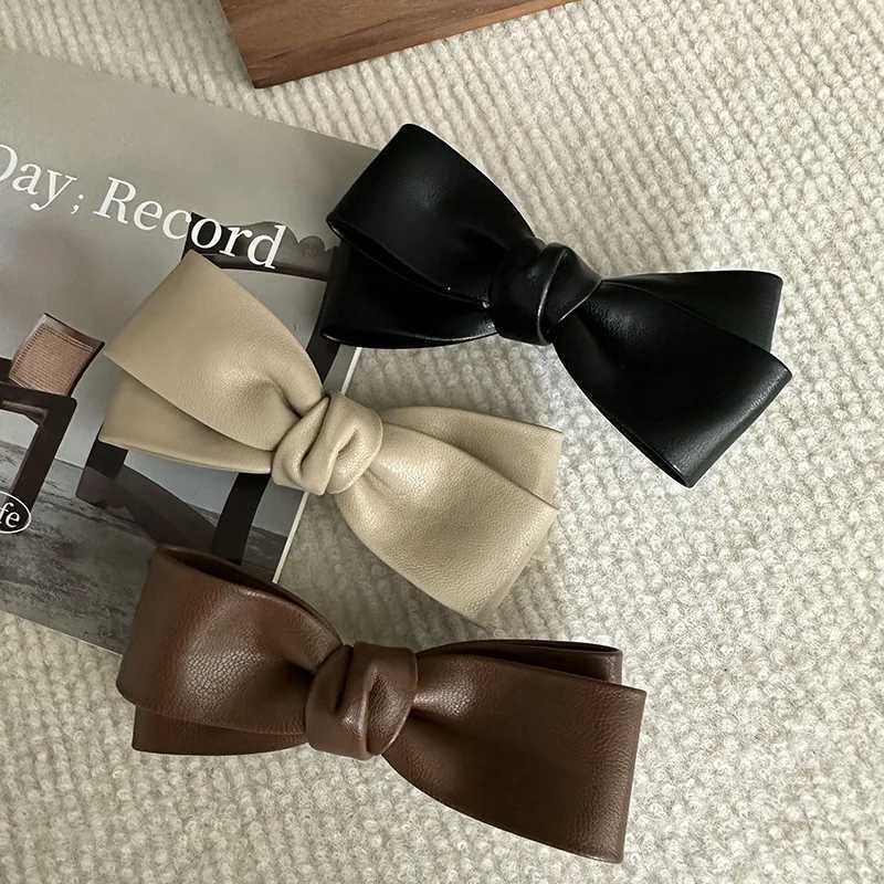 Ruoshui Woman Vintage PU Leather Bowknot Hairpins Ladies Fashion Hair Clips Hair Accessories Ornaments Barrettes Side clipW251028