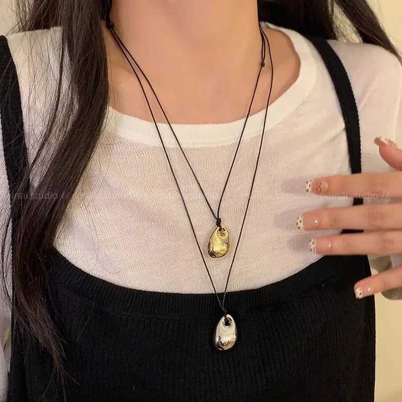 Minimalist Black Leather Rope Necklace Womens Autumn and Winter Simple Fashion Irregular Metal Pendant Long Sweater ChainXJ251030