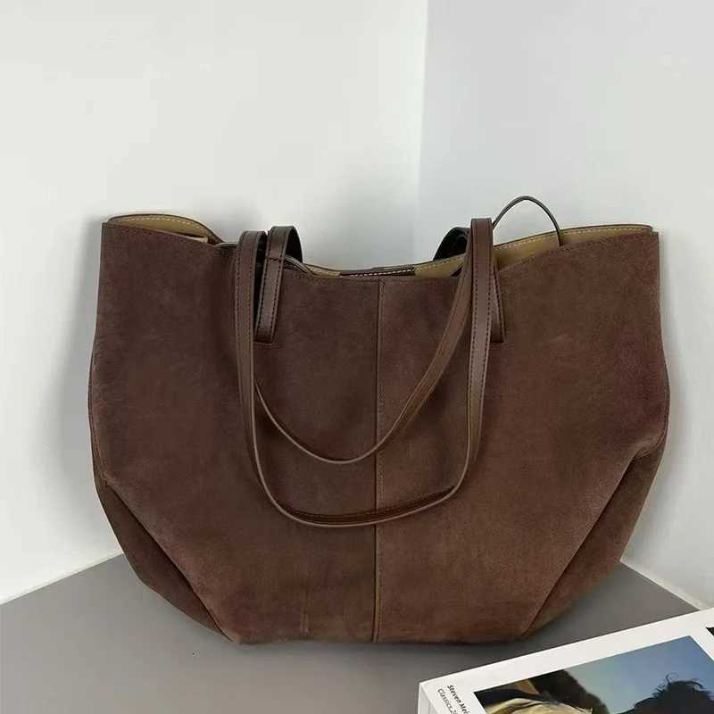 Designer bag New wens sandsuede handheld wing bag niche shopping bag handbag simple and largecapacity tote bag Y251029