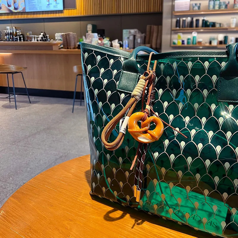 Fashion Multi Element Love Bag Pendant Nylon Rope Cute Creative Alkali Bread Ornament Key Holder Pendant Keychain Decor Gift 251030