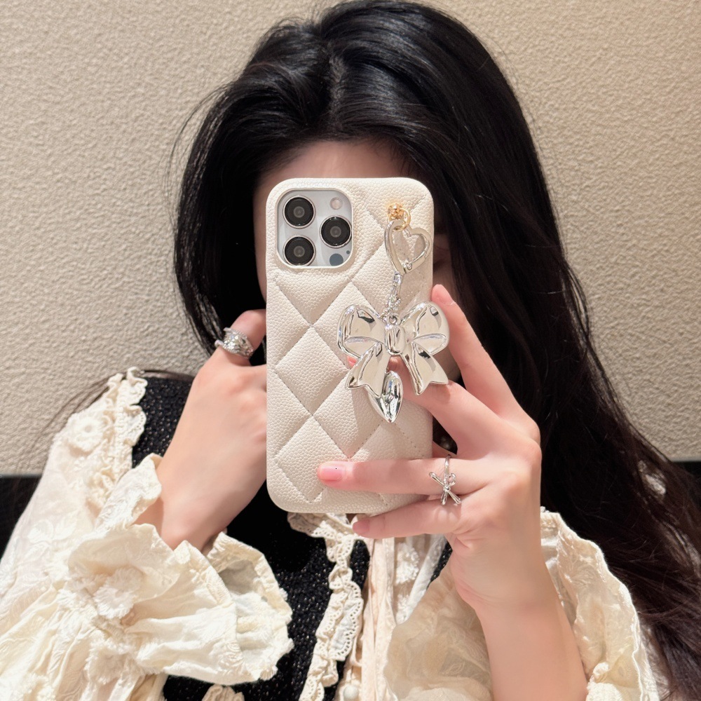 Bowknot Heart Pendant Solid Color Quilted Pattern Phone Case Compatible with iPhone 17/16 Pro 15 Simple