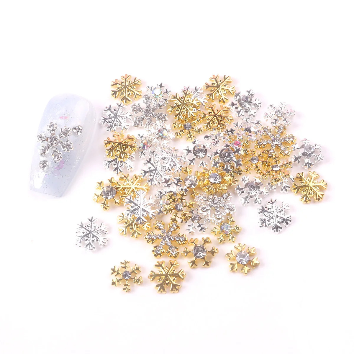 TSZS 50pcslot GoldSilver 3D Winter Snowflake Nail Art Charm Alloy Metal Christmas Nails Decoration DIY Nail Accessories 251027