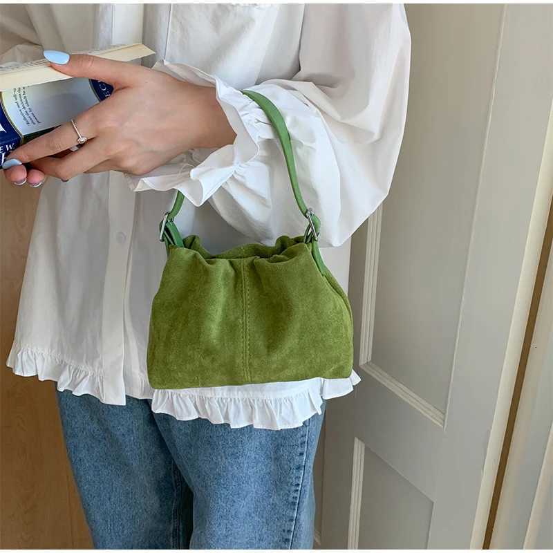 Designer bag Korean Versi Suede Drstring Bucket Bag Magnetic Buckle Cute Shoder Bag Simple Portable Daily Cmuting Wen Crossbody Bag Y251029
