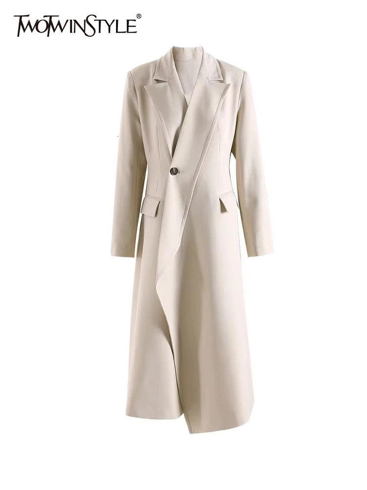 TWOTWINSTYLE Solid Spliced Pockets Irregular Trench For Women Lapel Long Sleeve Tunic Patchwork Button Temperament Coats Female 251029