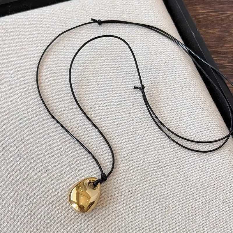 Minimalist Black Leather Rope Necklace Womens Autumn and Winter Simple Fashion Irregular Metal Pendant Long Sweater ChainXJ251030