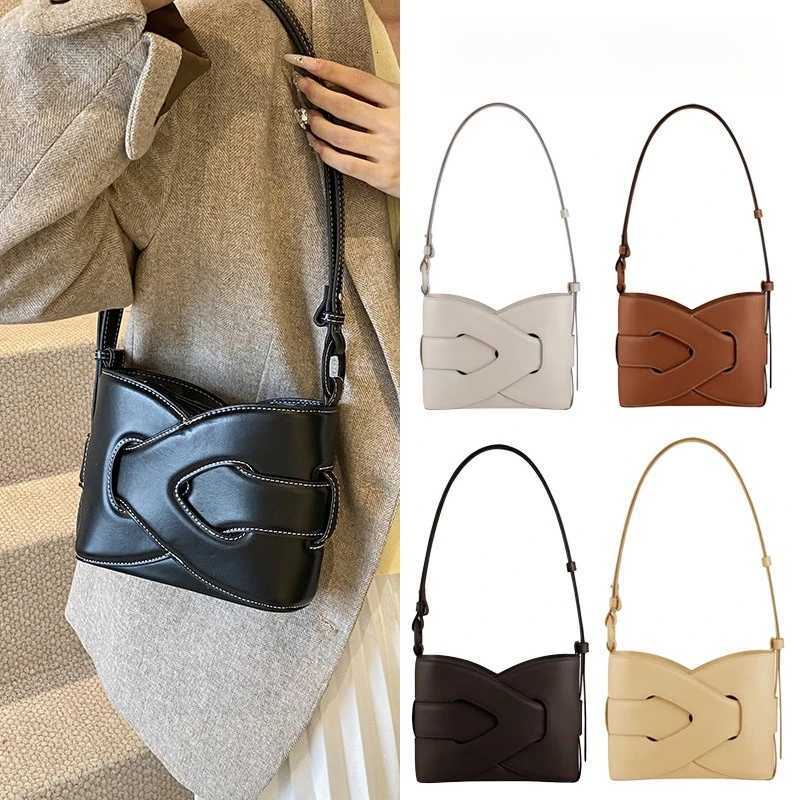 Designer bag 2025 style woven bag a niche vintage French shoder twist knot bag handheld crossbody bucket bag Y251029