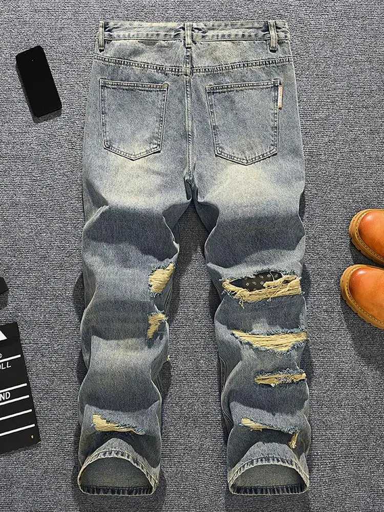 2025 personalized handsome ripped jeans mens street fashion brand loose straight leg wide leg retro distressed denim pants J251030