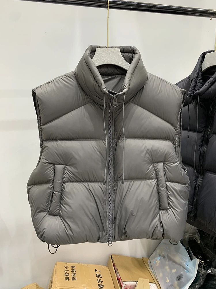 Autumn Winter Drawstring Stand Collar Down Vest Women White Duck Down Sleeveless Puff Vests Female Double Zipper Warm Waistcoats 251029