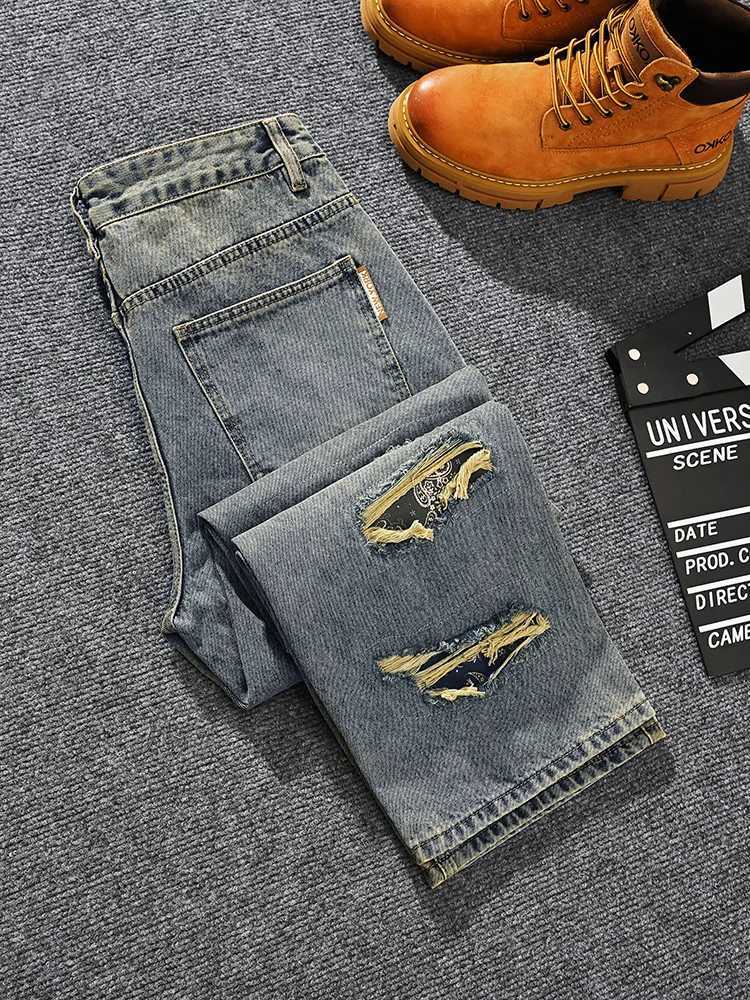 2025 personalized handsome ripped jeans mens street fashion brand loose straight leg wide leg retro distressed denim pants J251030