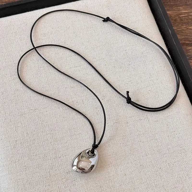 Minimalist Black Leather Rope Necklace Womens Autumn and Winter Simple Fashion Irregular Metal Pendant Long Sweater ChainXJ251030