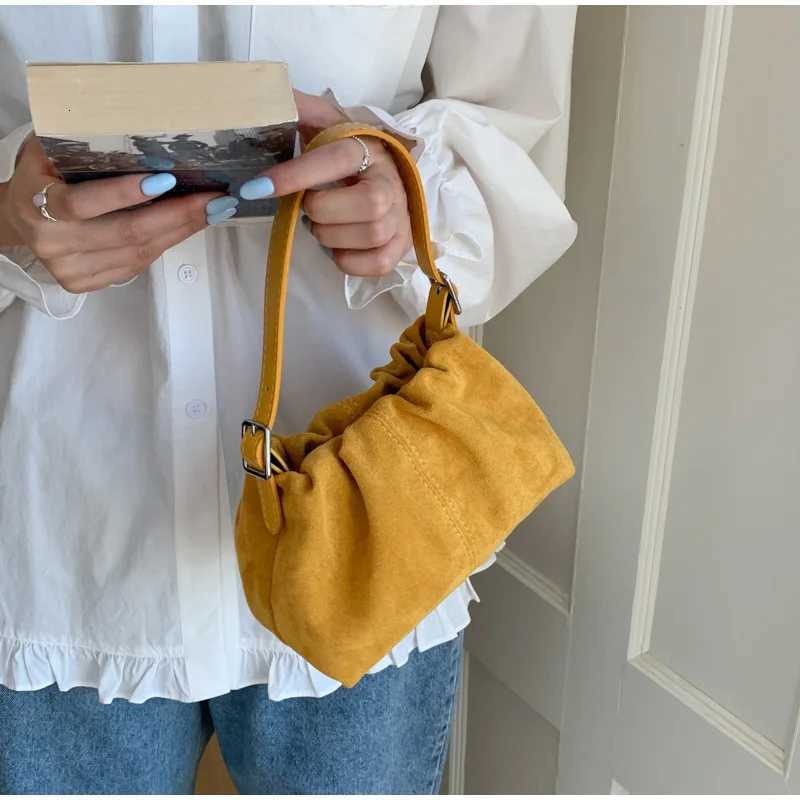 Designer bag Korean Versi Suede Drstring Bucket Bag Magnetic Buckle Cute Shoder Bag Simple Portable Daily Cmuting Wen Crossbody Bag Y251029