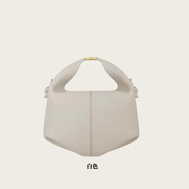 Designer bag Bento bag handheld crossbody bag French niche design lunch box wens bag dumplings Y251029