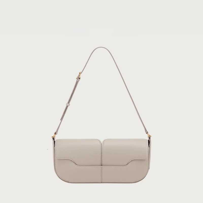 Designer bag Niche autumn and winter cmuting singleshoder underarm bag cowhide handbag casual and simple handheld baguette bag Y251029