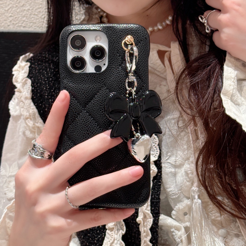 Bowknot Heart Pendant Solid Color Quilted Pattern Phone Case Compatible with iPhone 17/16 Pro 15 Simple