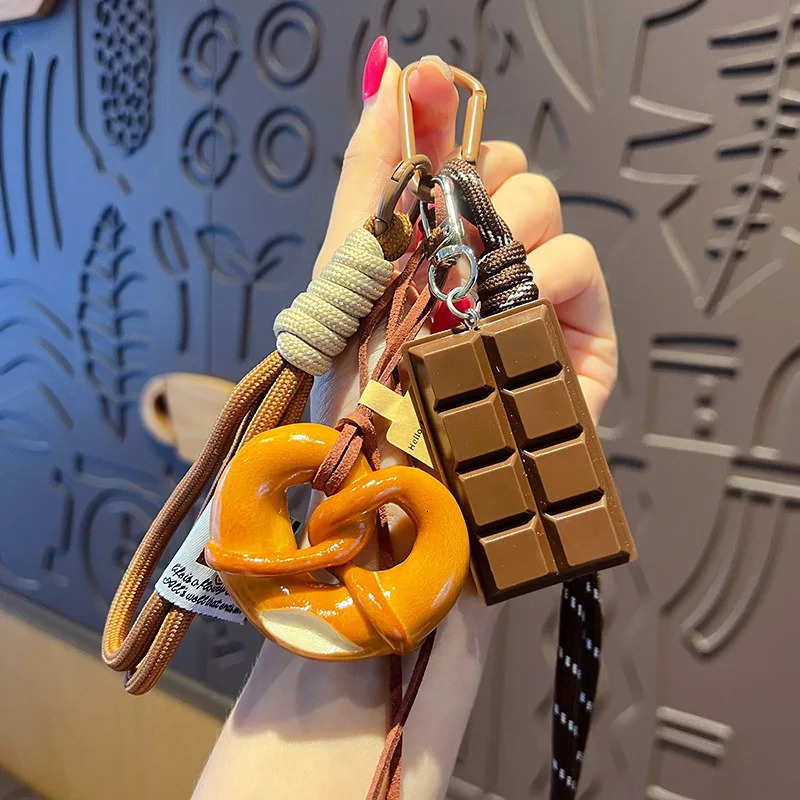 Fashion Multi Element Love Bag Pendant Nylon Rope Cute Creative Alkali Bread Ornament Key Holder Pendant Keychain Decor Gift 251030