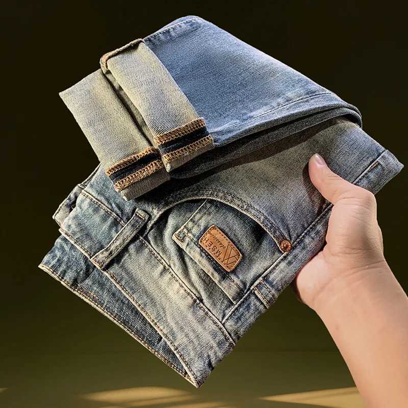 Nine point ripped denim jeans for men in the summer of 2025 thin and trendy brand retro washed narrow leg elastic denim pants J251030