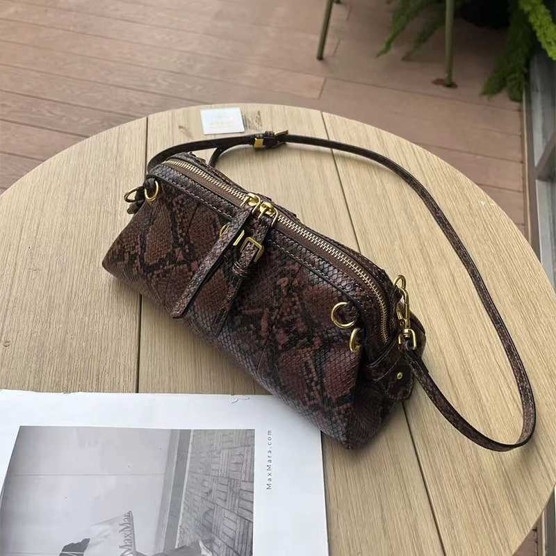 Designer bag Brand Snake Pattern Backpack Fi Crossbody Clip Bag Highend Handheld Shoder Bag Large Capacity Hot Girl Wens Bag Y251029