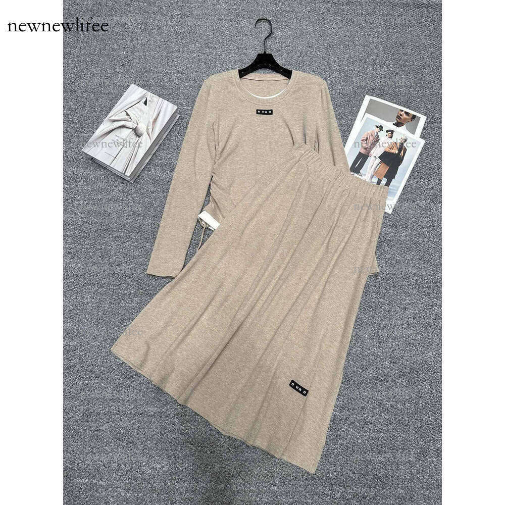 Basic Casual Women's Designer Long Sleeve Drawstring Design Matching Half-Length Skirt Two-Color Versatile Casual Korean Style Fashion Two-Piece Set
