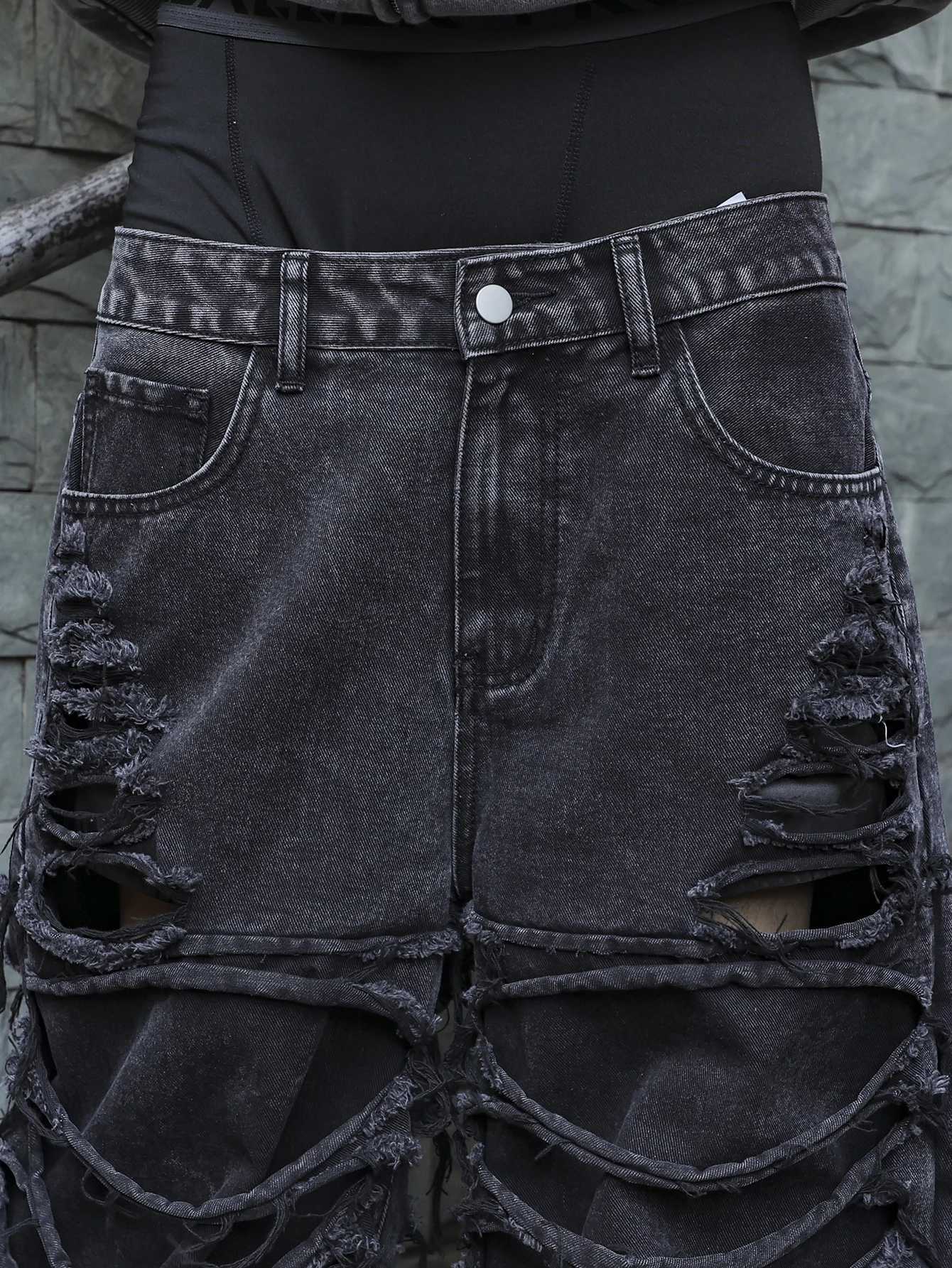 Mens black jeans With a design of ripped holes and tassels In a street trend style J2510301