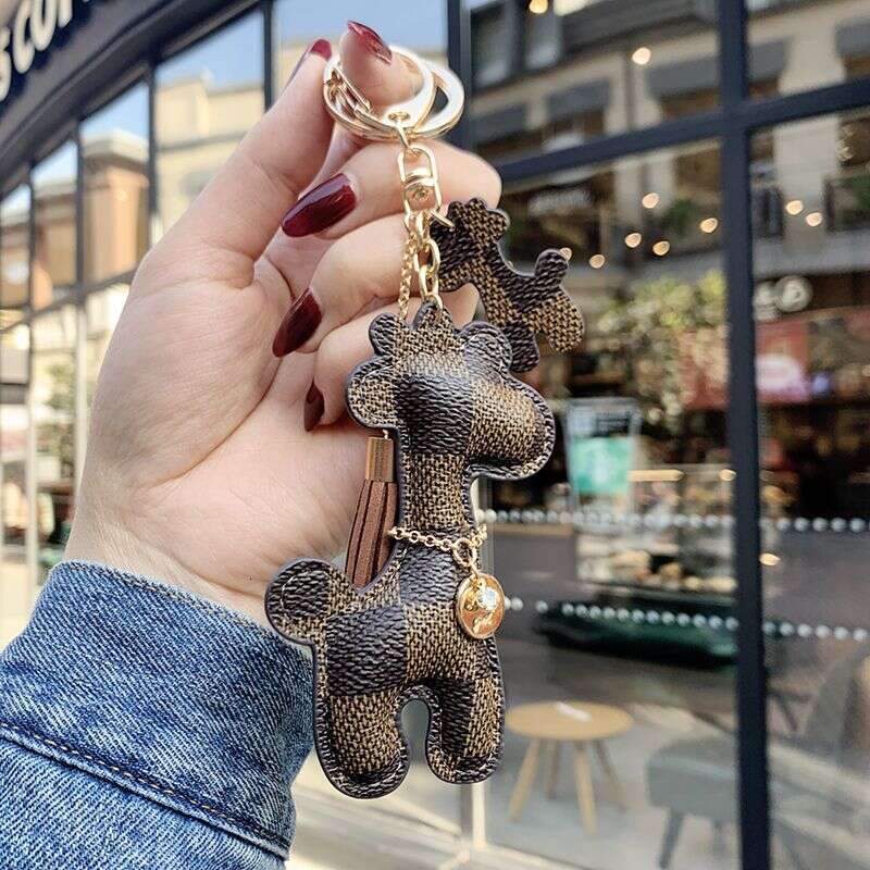 Keychain bag charm Designer charms Trendy Fashionable Car pendant Simple pu Leather accessories