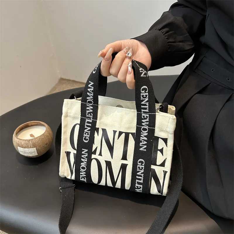 Forward Mini Canvas Crossbody Bag Stylish Modern Letter Print Comfortable Wide Strap Tote Everyday Chic Versatile Handbag W251031
