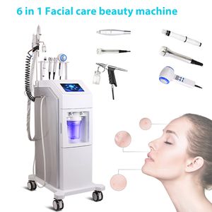 Machine à jet facial Dermabrasion peelig Nettoyage de la peau Traitement du visage Ultrason RF Microdermabrasion Pistolet à oxygène Marteau chaud et froid