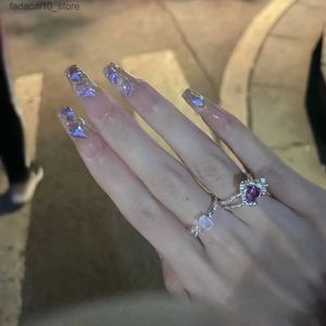 Faux ongles Les faux ongles portés à la main avec une aurore violette blanche et un diamant complet sont détachables et durables. Q240122