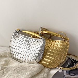 Bolso de mujer tejido de tiburón de diseño famosa, bolso de albóndigas de gran capacidad, bolso de hombro individual de viaje y compras, bolso de cuero de mango de metal, estilo de moda de alta gama