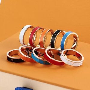 Nuevo anillo de banda de letras de diseño de lujo para hombre para mujer Unisex Multicolor de esmalte de esmalte Accesorios de joyería de moda Regalo de novia