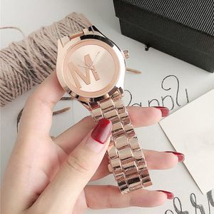 Marque de mode montre-bracelet hommes femmes fille Style métal acier bande Quartz horloge