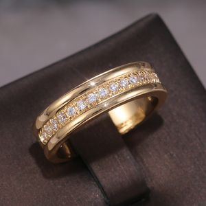 Anillo de boda clásico a la moda para mujer, anillos simples con pedrería CZ pavimentada en el medio, joyería de compromiso femenina delicada y discreta