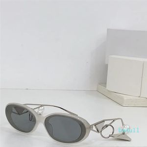 design de mode petites lunettes de soleil ovales monture en acétate branches en métal simples et style lunettes de protection UV400 extérieures avec pendentif exquis