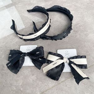 Diseñador de moda Diademas Letras para el cabello Carta vintage Bowknot Horquilla Moda para mujer Diadema Negro Blanco Marca popular Accesorios para el cabello Accesorios