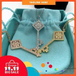 Créateur de mode tiff ring top T maison 925 sterling argent clé collier polyvalent diamant incrusté tournesol noeud chinois pendentif simple chaîne de pull M74W