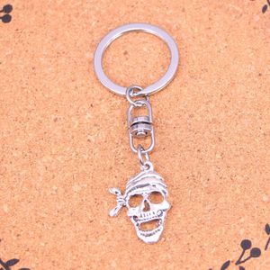 LLavero de moda 27*20mm pirata esqueleto calavera colgantes DIY joyería coche llavero con anilla soporte recuerdo para regalo