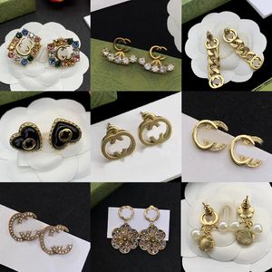 Fashion Luxury Four-Leaf Cordings Nacre Shell 18K Gold Agate Diseñador Pendientes para mujeres Pendientes de alta calidad Joyería