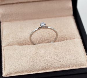 Fashion-Titanium Steel Lovers Band Rings avec un gros diamant de 1,1 mm pour femmes et hommes bijoux de mariage livraison gratuite PS5448