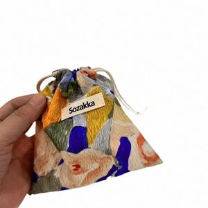 Bolsa de lienzo floral Regalo de Navidad Regalos de dulces Cosméticos Monedas Organizador Bolsas de embalaje de lápiz labial Bolsa de almacenamiento 18M8#