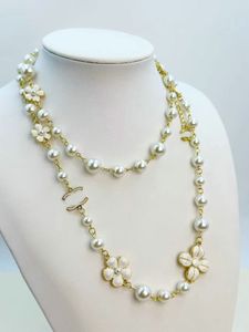 Collier de fleurs et de perles pour femmes, longue chaîne de pull, collier de luxe de styliste, multicouches, ras de cou