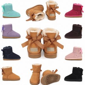 Chaussures enfants uggi bottes chaudes australiennes tout-petits mini botte demi-neige avec des arcs chaussure bowknot filles baskets enfants garçons chaussures en cuir