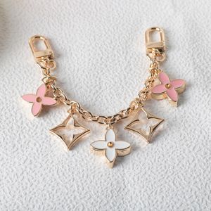 Pendentif élément trèfle à quatre feuilles Décoration de sangle en métal Fermeture éclair convertible et remplaçable Pendentif porte-bonheur délicat et doux haut de gamme