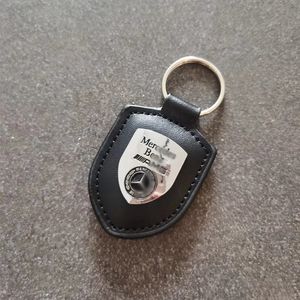 Generación de llaves de llave de llave automotriz de cuero de cuero llavero de llaves de carcasa portavoz de carcasa para carcasa de llave de Mercedes Benz AMG