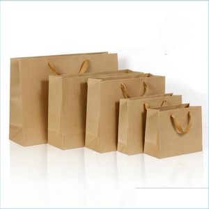 Envoltura de regalo 10 tamaños Stock y bolsa de regalo de papel personalizada Brown Kraft con asas al por mayor 401 J2 Entrega de gota Home Garden Festive P DH5J3