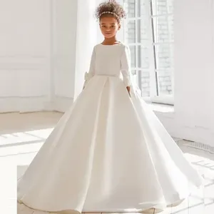 Robes de fille en Satin blanc à manches longues, fleur, ceinture en cristal, robes de première Communion pour enfants, jupe bouffante avec nœud papillon